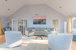 Beautiful seating area off of kitchen with views of pond.