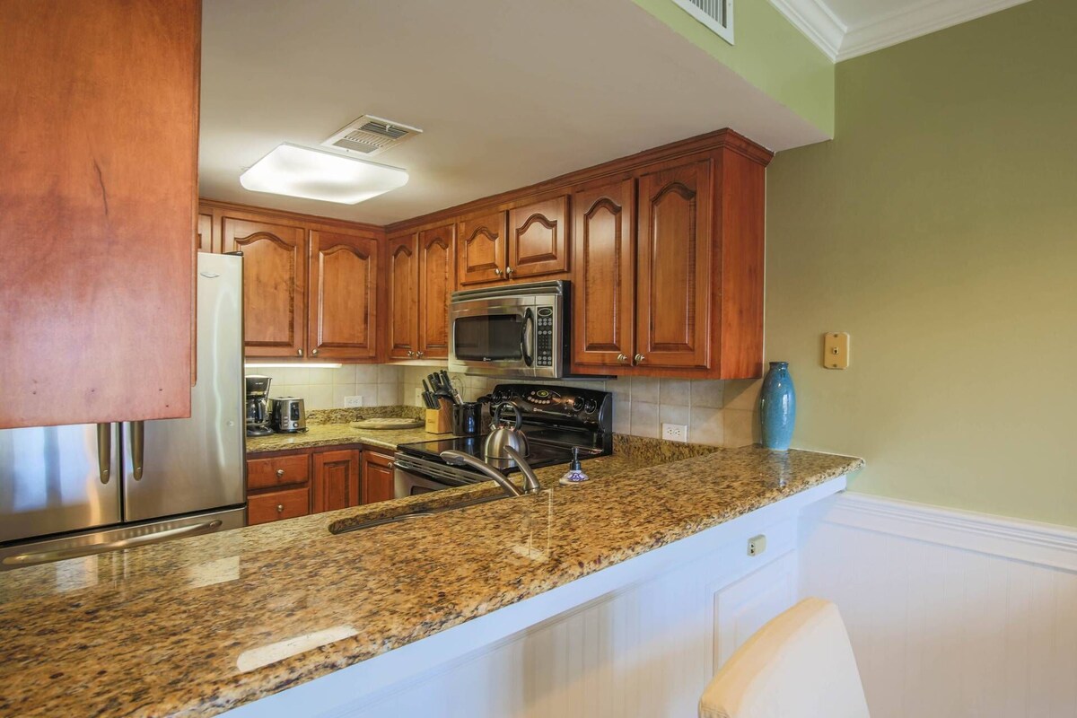 See, Feel & Hear the Ocean Waves & Beach Club Pools from this Corner Villa w/ Screened Balcony