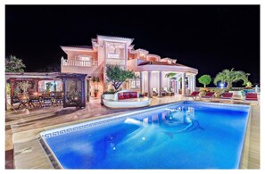 Villa & pool by night. The pool is heated to 29c all year round.