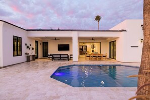 Main Pool w/ Tanning Ledge and Covered Patio Space