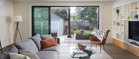 Open the big doors and connect the outdoor and indoor spaces 