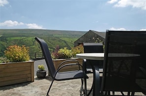 Patio area to the front of Hill Top Cottage in Walden dale near West Burton in the Yorkshire Dales