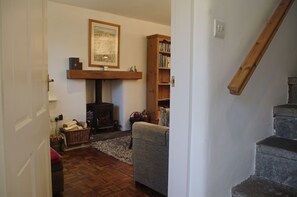 Cosy lounge with woodburning stove at School House in Askrigg, Wensleydale in the Yorkshire Dales