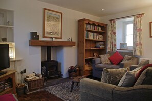 Cosy lounge with woodburning stove at School House in Askrigg, Wensleydale in the Yorkshire Dales
