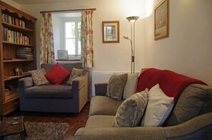 Cosy lounge with woodburning stove at School House in Askrigg, Wensleydale in the Yorkshire Dales