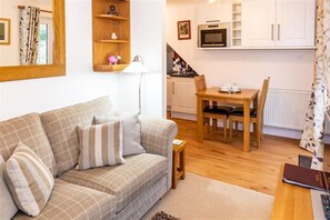 Lounge with woodburning stove at Beck Side in West Burton, Wensleydale in the Yorkshire Dales