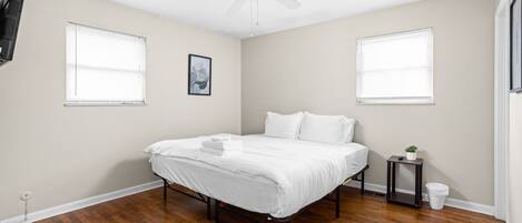 Wake up in the bedroom of your dreams with natural light, cool air, and high-quality linens.