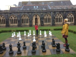 Large chess in the cloisters 