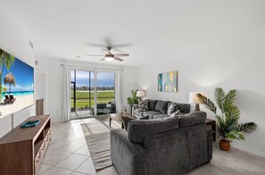 Living Room w/ Comfortable Furnishings & Views of the Golf Course