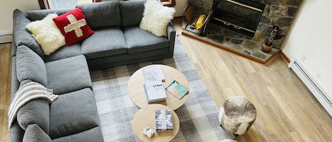 Living room with fireplace and brand new furniture 