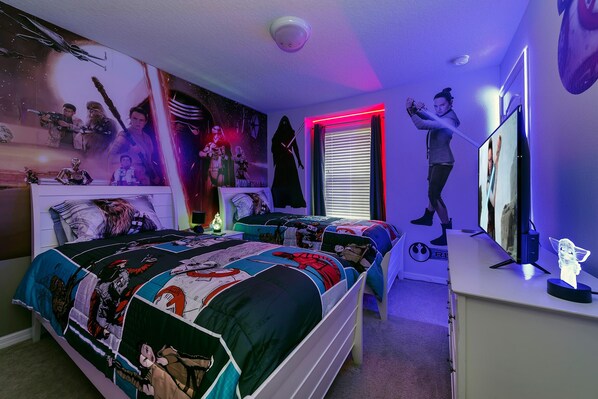 Star Wars-themed bedroom, smart TV.
The Force is Strong with this One!
