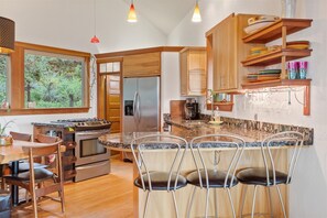 Breakfast bar for three in open and social kitchen