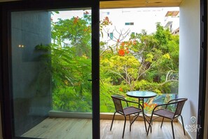 Leave the door open to extend the space to the outdoors