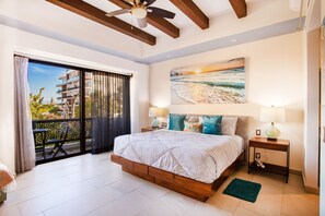 Master bedroom with king size bed and ample balcony