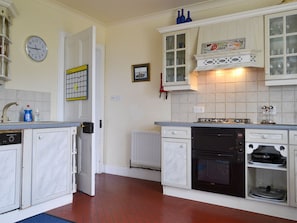 Kitchen | Sunrise Apartment, Lochmaddy
