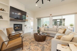 The living room television is great for entertaining and the fireplace creates a cozy environment during cold months.