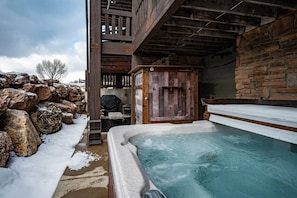 Enjoy the private hot tub on the lower level patio!