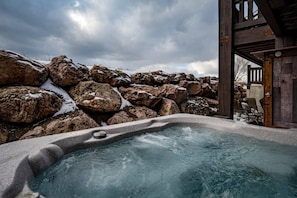 Relax under the stars in the private hot tub!