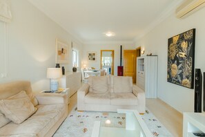 Living room with access to the kitchen