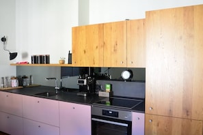 Full kitchen with the espresso coffee machine