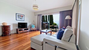 Inviting living room at Villa Antonina: stylish decor and panoramic ocean views create a serene atmosphere. #bbq #outdoor #oceanview