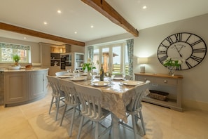 Field Corner, Docking: Dining area with table and seating for eight and access to garden