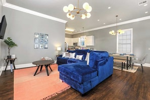 Your spacious haven! Another view of the comfortable living room, designed for relaxation and enjoyment.