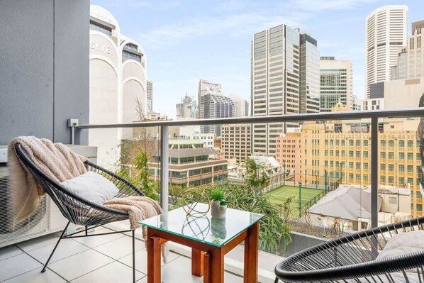 A private balcony with city views.