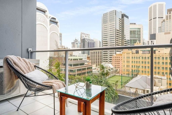 A private balcony with city views.