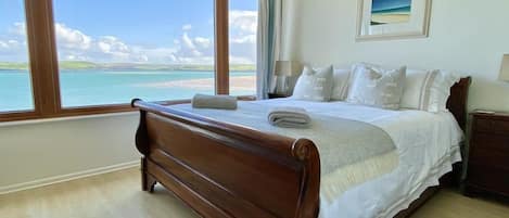 Double bed in the bedroom at 14 The Boatyard, Padstow, North Cornwall