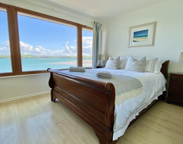 Double bed in the bedroom at 14 The Boatyard, Padstow, North Cornwall