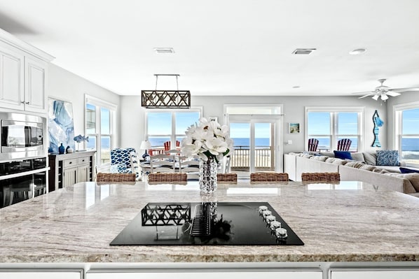 Open concept kitchen, dining room, and living room - with lovely gulf views!