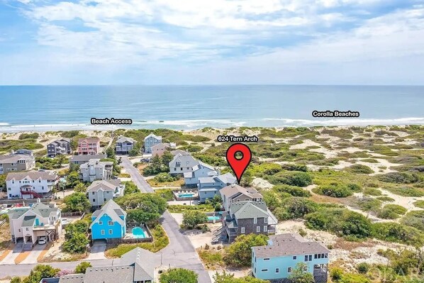 Beach access just straight down the street (6 houses down) and no neighbors behind you! 