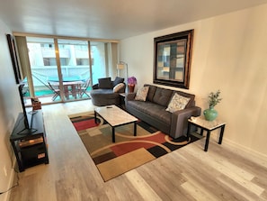 Newly renovated living room with easy pull out sleeper sofa!