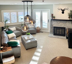 Cozy living room with wood burning fireplace