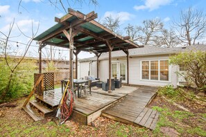 Backyard deck is great to lounge and hang with friends!