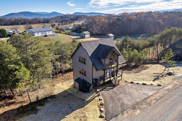 Drone shot with mountains in the background.