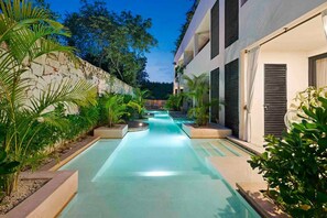 Step directly off our back terrace into the swim-up pool, for a relaxing, evening swim