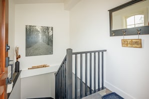 Welcome, spacious entry with coat hooks.