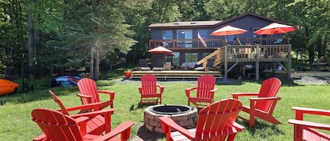 lakeside firepit with seating for 8.