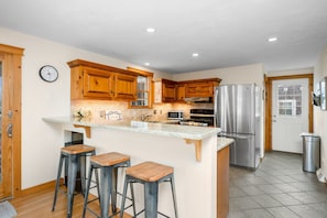 Kitchen with stainless steel appliances.