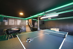 Play simultaneously ping pong, foosball, video games AND board games.