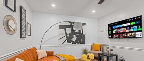 Living room with HUGE Smart TV.