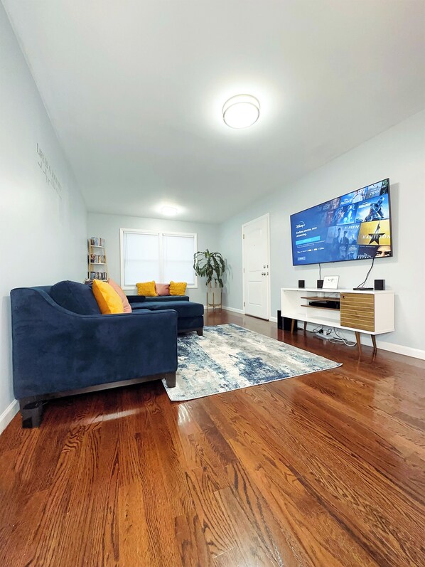 Living Room with 65inch SmartTV and Home Theater 