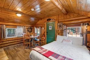 Front room of cabin. Dining area, Cabin Entrance, Queen Bed