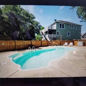 House is now painted blue instead of light green. 