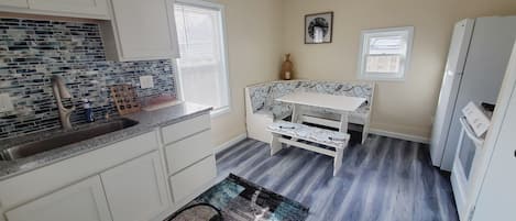 Kitchen with banquette dining.