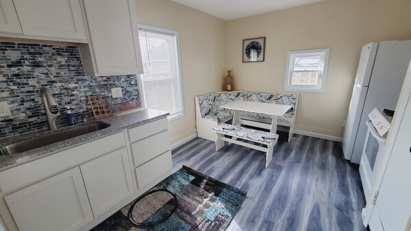 Kitchen with banquette dining.