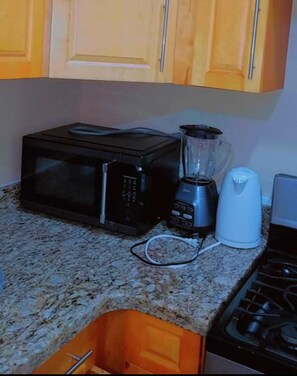 Microwave, electric kettle & blender available.