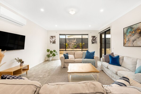 Rumpus room with smart tv. 
